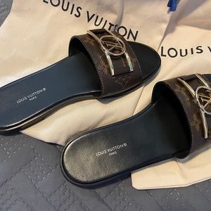 Louis Vuitton brand new authentic Lock it Flat mules sands